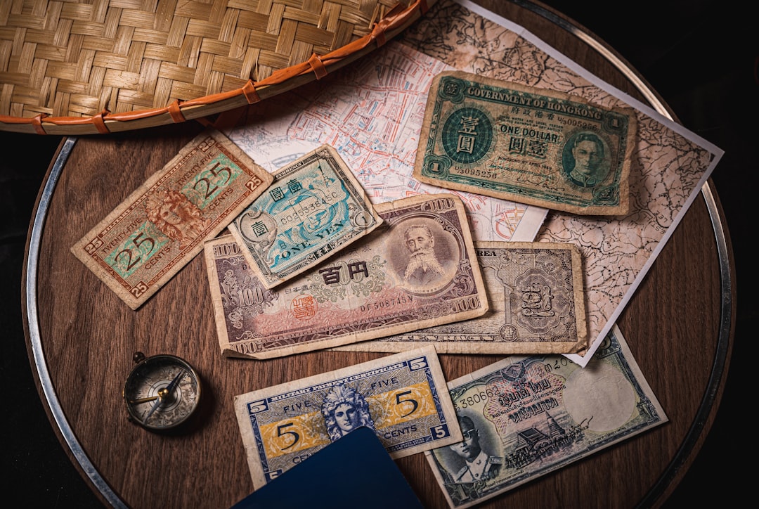 Various vintage military currencies and payment certificates from 1950-1970.